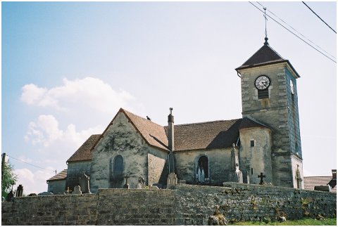 The church dominates the south of the village.