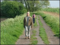 The track between the river and the railway line.