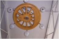 Wheel light, carved by Raymond Lintott